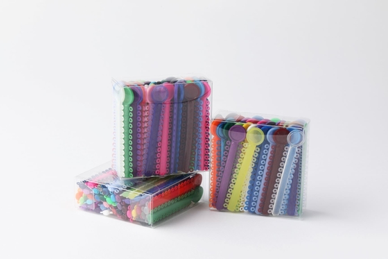 comprar Vestidos de ligadura elástica ortodóntica de colores para un tratamiento dental óptimo online manufacture